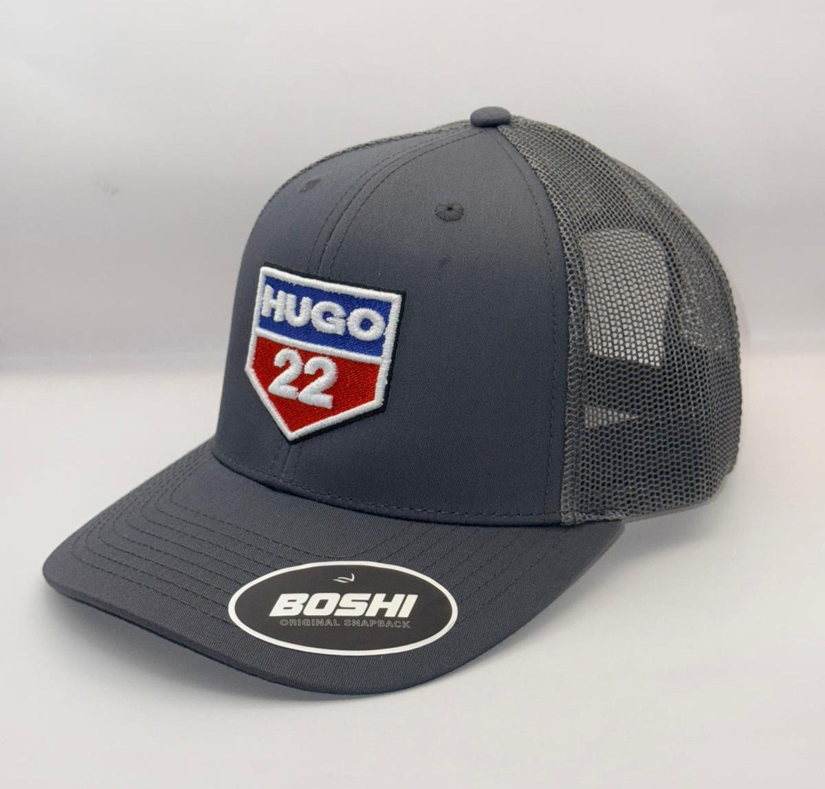 Gray cap with a logo and text on a white background